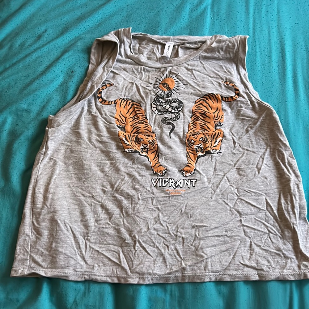 From the store Q here in AZ, size medium, soft material, cropped tank top